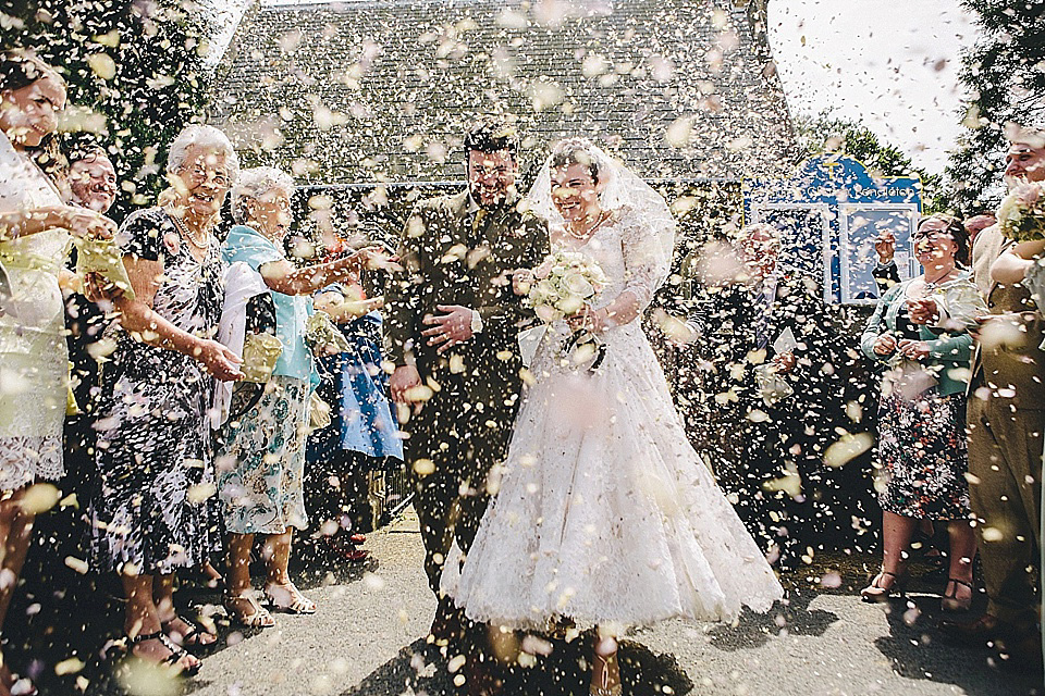 The bride wears 'Sophia' by Ian Stuart for her sweet, local, intimate and vintage inspired village wedding. Photography by The Twins.