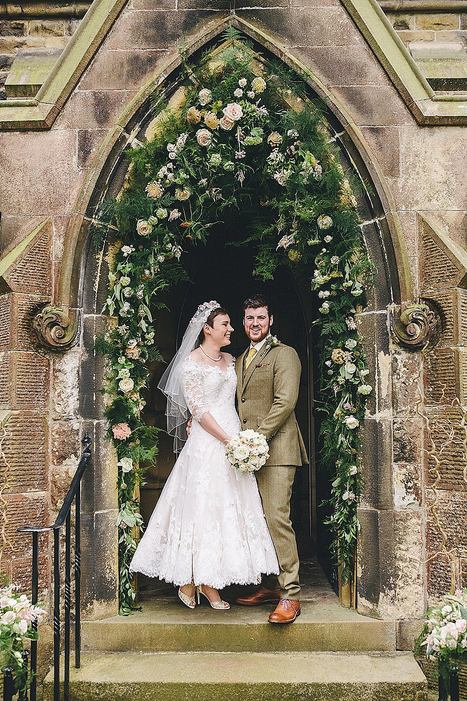 The bride wears 'Sophia' by Ian Stuart for her sweet, local, intimate and vintage inspired village wedding. Photography by The Twins.