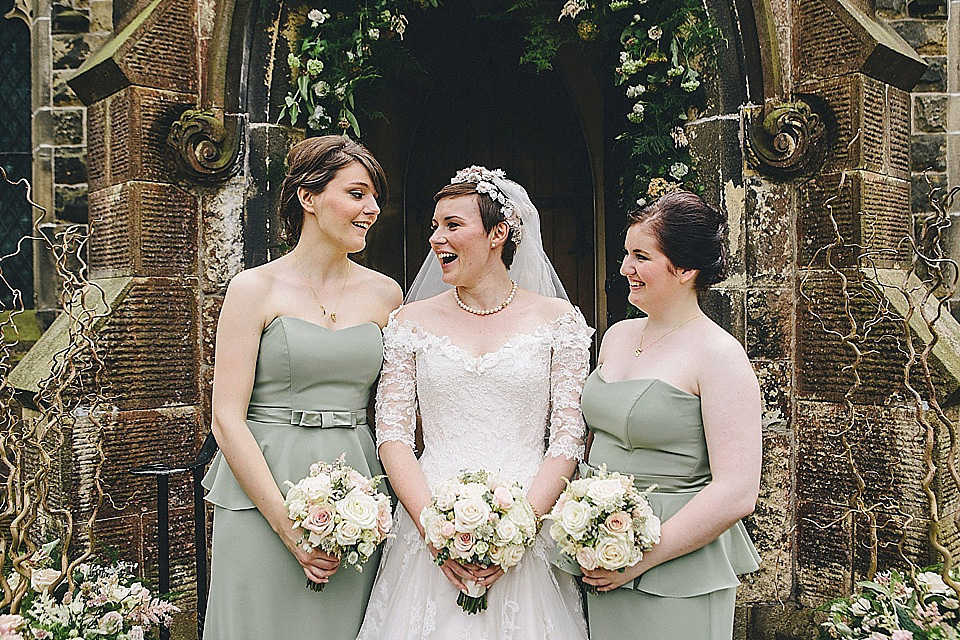 The bride wears 'Sophia' by Ian Stuart for her sweet, local, intimate and vintage inspired village wedding. Photography by The Twins.