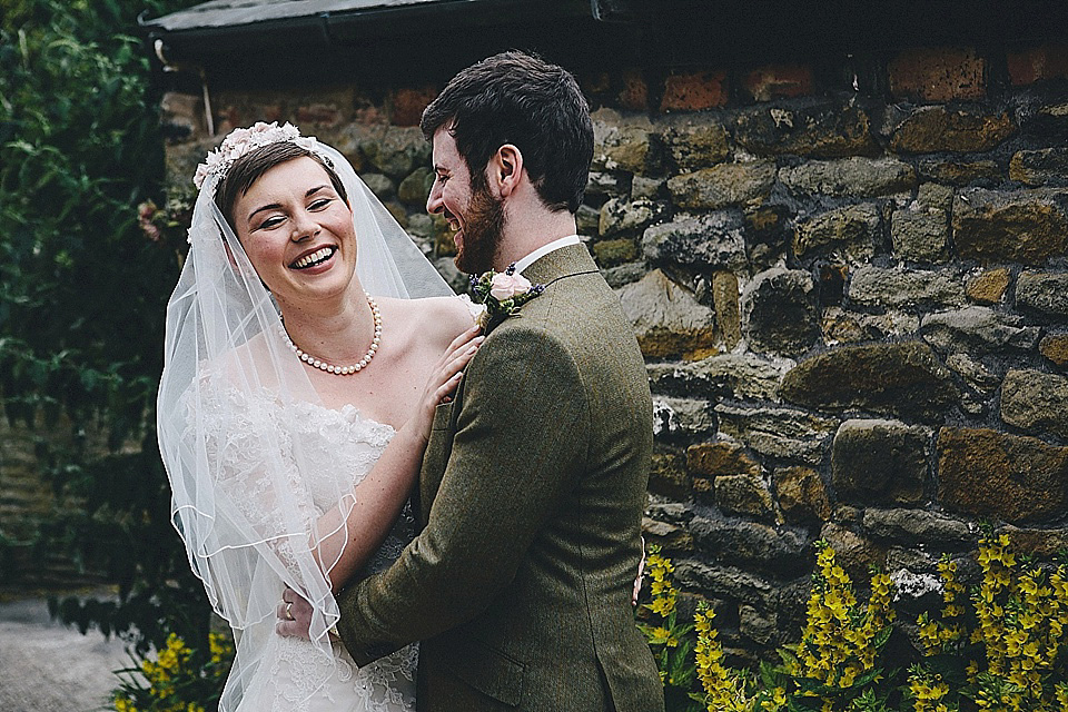 The bride wears 'Sophia' by Ian Stuart for her sweet, local, intimate and vintage inspired village wedding. Photography by The Twins.