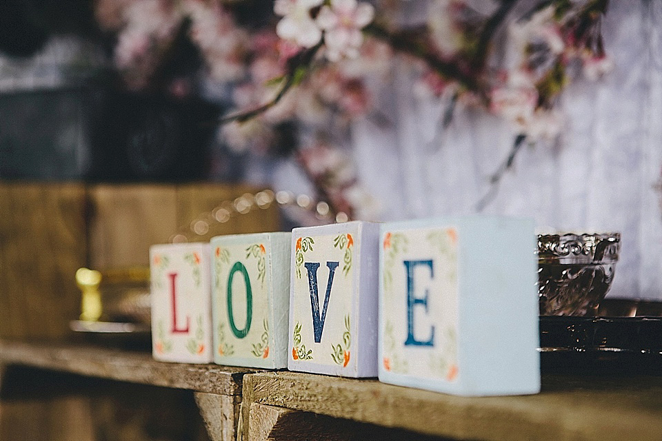 The bride wears 'Sophia' by Ian Stuart for her sweet, local, intimate and vintage inspired village wedding. Photography by The Twins.