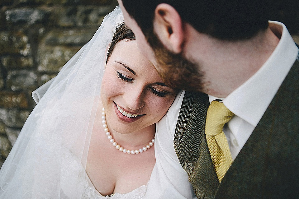 The bride wears 'Sophia' by Ian Stuart for her sweet, local, intimate and vintage inspired village wedding. Photography by The Twins.