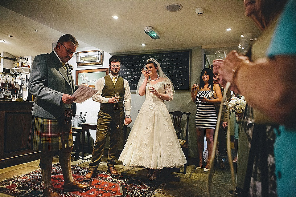 The bride wears 'Sophia' by Ian Stuart for her sweet, local, intimate and vintage inspired village wedding. Photography by The Twins.