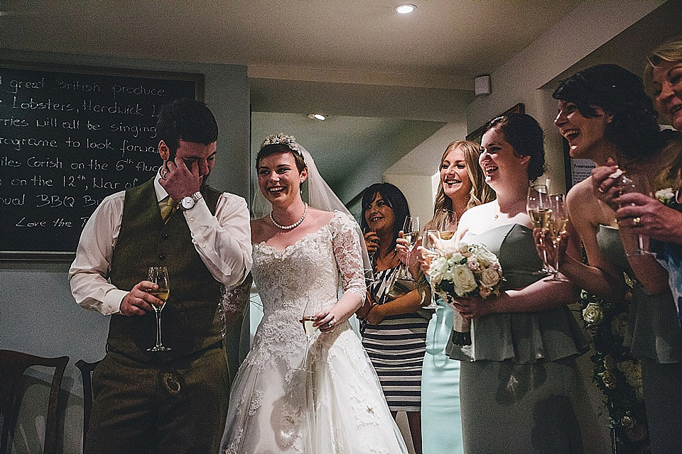 The bride wears 'Sophia' by Ian Stuart for her sweet, local, intimate and vintage inspired village wedding. Photography by The Twins.