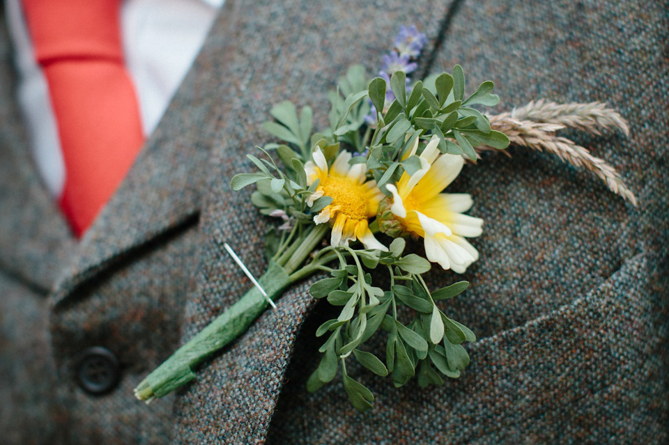 A Humanist handfasting outdoor ceremony at The Secret Herb Garden, just outside Edinburgh. The bride wore 'Minna'. Photography by Caro Weiss.