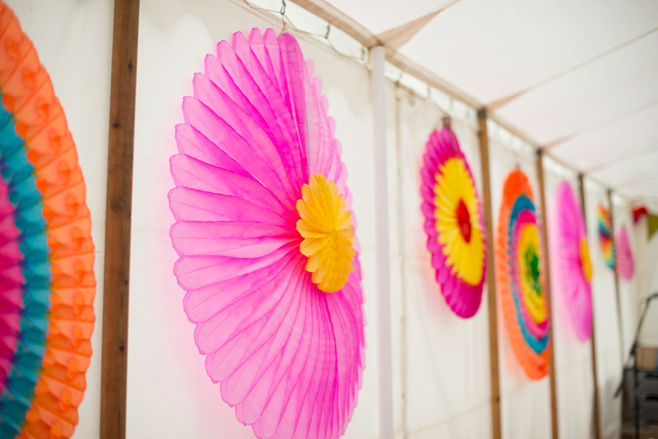 The bride wears Katya Katya Shehurina for her colourful country garden wedding. Photography by Kayleigh Pope.