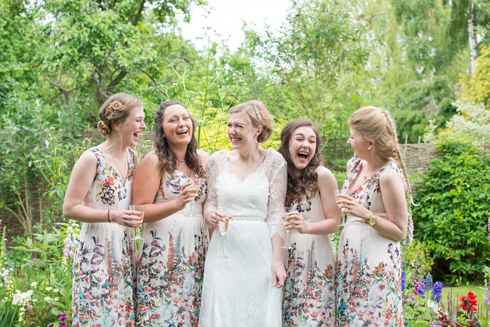 The bride wears Katya Katya Shehurina for her colourful country garden wedding. Photography by Kayleigh Pope.