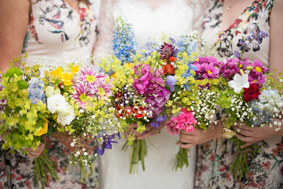 The bride wears Katya Katya Shehurina for her colourful country garden wedding. Photography by Kayleigh Pope.