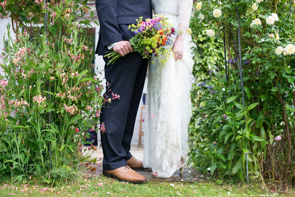 The bride wears Katya Katya Shehurina for her colourful country garden wedding. Photography by Kayleigh Pope.