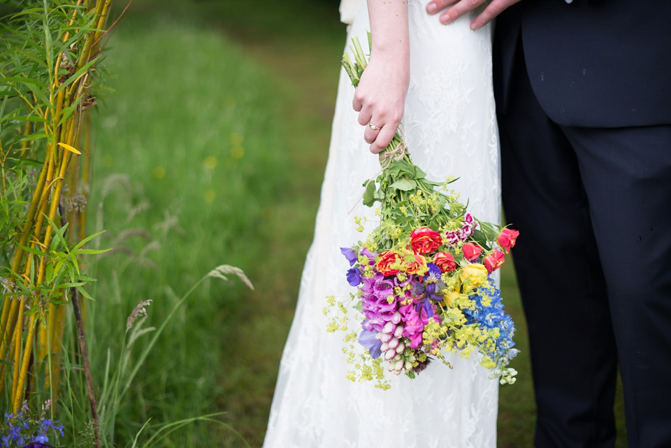 The bride wears Katya Katya Shehurina for her colourful country garden wedding. Photography by Kayleigh Pope.