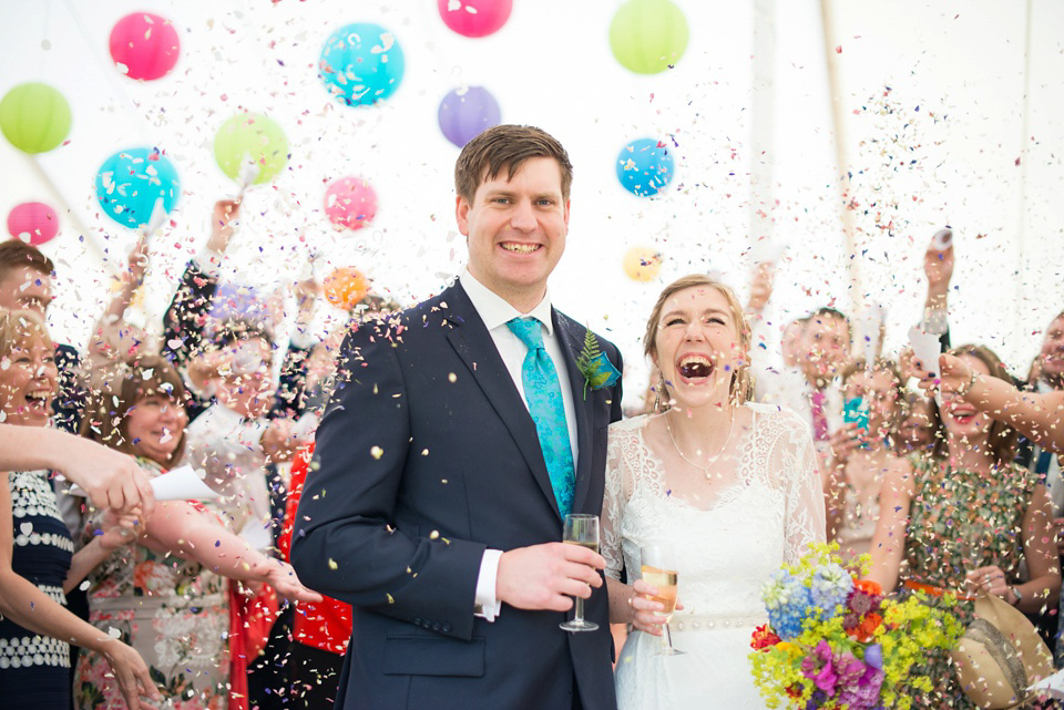 The bride wears Katya Katya Shehurina for her colourful country garden wedding. Photography by Kayleigh Pope.