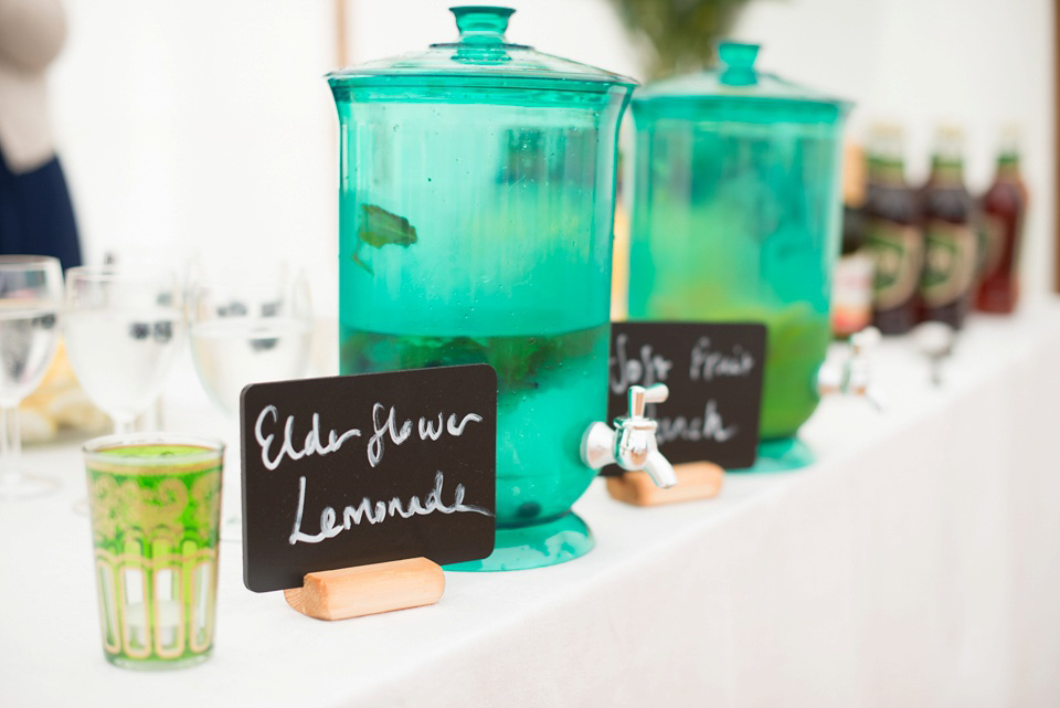 The bride wears Katya Katya Shehurina for her colourful country garden wedding. Photography by Kayleigh Pope.