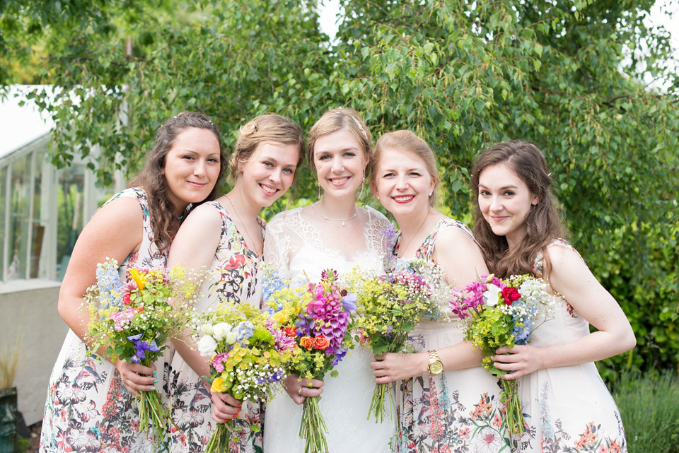 The bride wears Katya Katya Shehurina for her colourful country garden wedding. Photography by Kayleigh Pope.