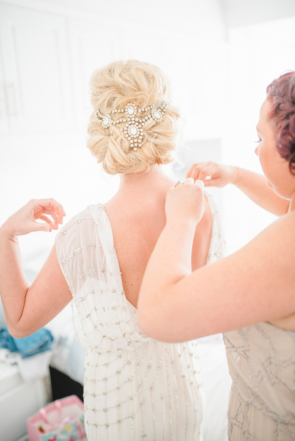 A Bali inspired beach wedding in Tynemouth with the bride wearing Jenny Packham. Photography by Sarah-Jane Ethan.