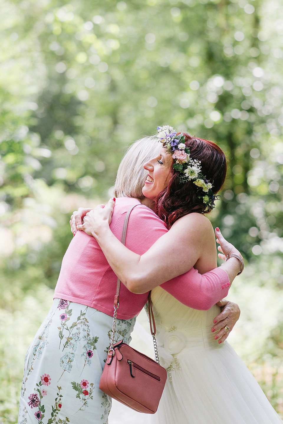 A Wildflower Crown for a Midsummer Dream inspired Humanist Wedding in a Bluebell Wood. Photography by Georgina Harrison.