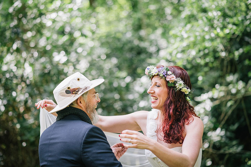 A Wildflower Crown for a Midsummer Dream inspired Humanist Wedding in a Bluebell Wood. Photography by Georgina Harrison.