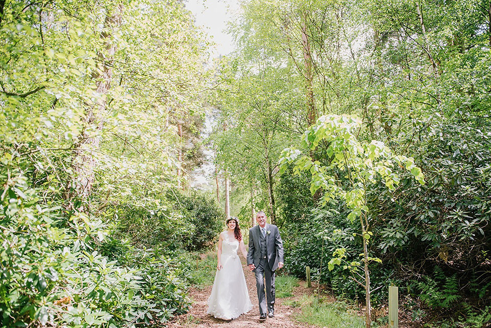 A Wildflower Crown for a Midsummer Dream inspired Humanist Wedding in a Bluebell Wood. Photography by Georgina Harrison.