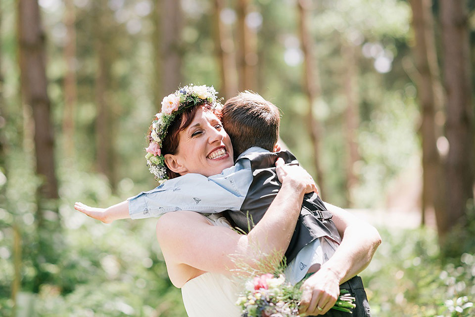 A Wildflower Crown for a Midsummer Dream inspired Humanist Wedding in a Bluebell Wood. Photography by Georgina Harrison.