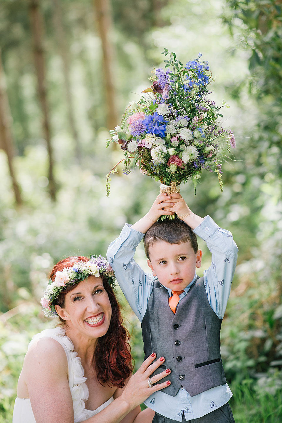 A Wildflower Crown for a Midsummer Dream inspired Humanist Wedding in a Bluebell Wood. Photography by Georgina Harrison.