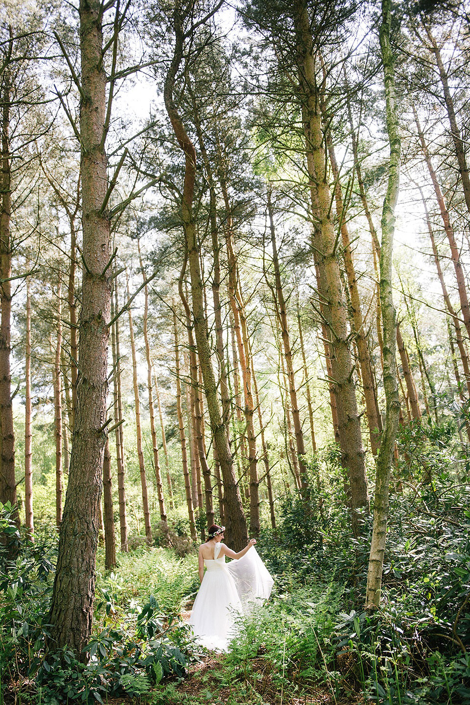 A Wildflower Crown for a Midsummer Dream inspired Humanist Wedding in a Bluebell Wood. Photography by Georgina Harrison.