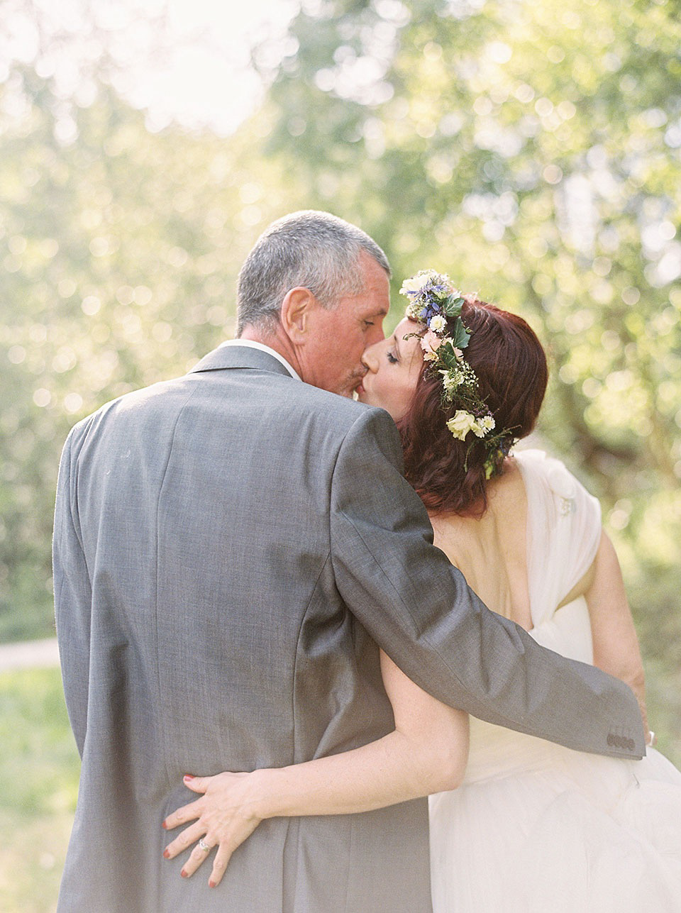 A Wildflower Crown for a Midsummer Dream inspired Humanist Wedding in a Bluebell Wood. Photography by Georgina Harrison.