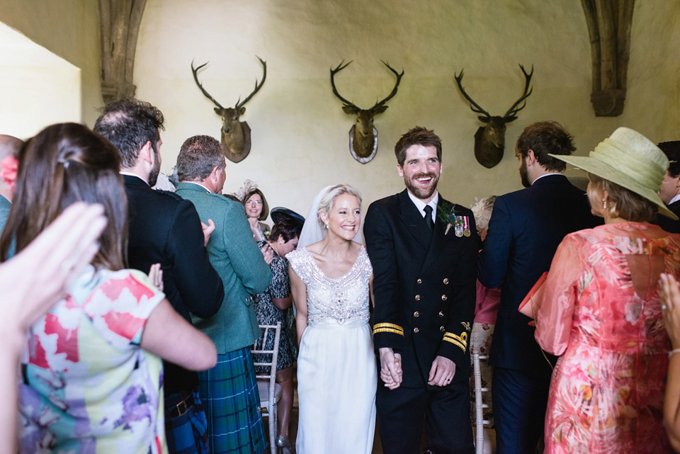 An Anna Campbell Gown, Kilts and Military Regalia for a Humanist Scottish Castle Wedding. Photography by Nikki Leadbetter.