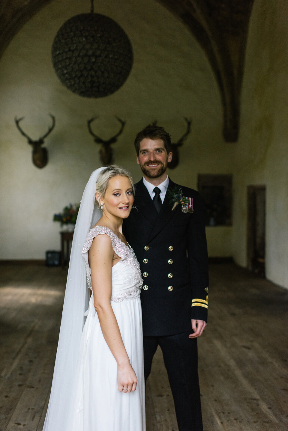 An Anna Campbell Gown, Kilts and Military Regalia for a Humanist Scottish Castle Wedding. Photography by Nikki Leadbetter.