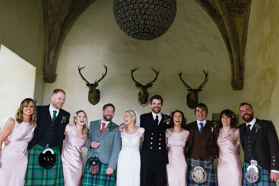 An Anna Campbell Gown, Kilts and Military Regalia for a Humanist Scottish Castle Wedding. Photography by Nikki Leadbetter.