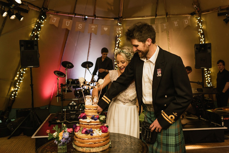 An Anna Campbell Gown, Kilts and Military Regalia for a Humanist Scottish Castle Wedding. Photography by Nikki Leadbetter.