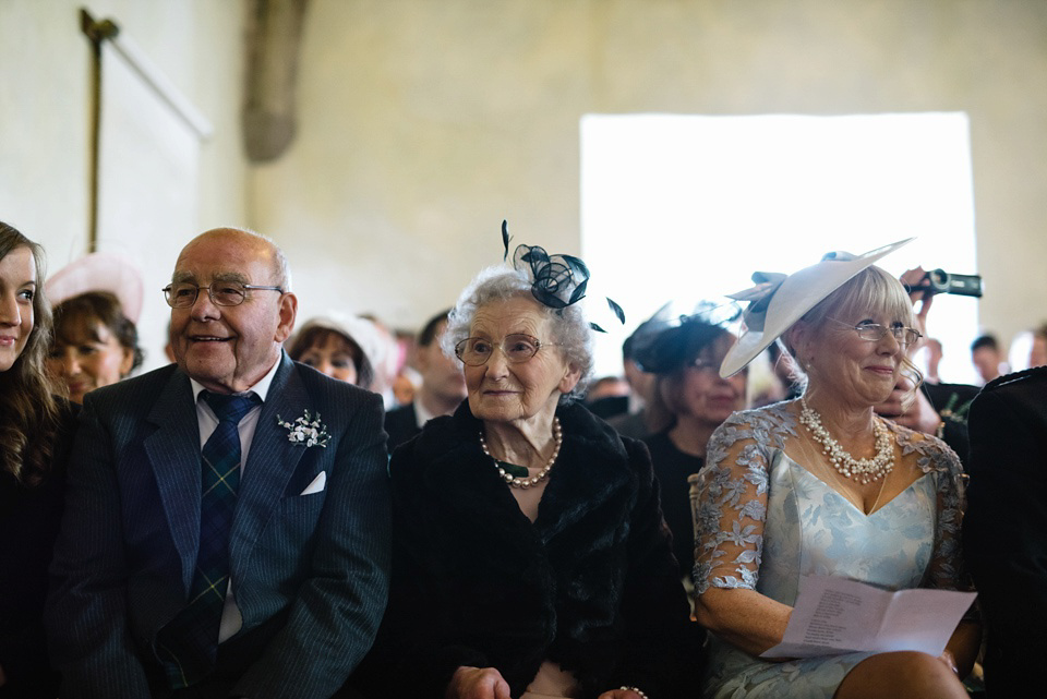 An Anna Campbell Gown, Kilts and Military Regalia for a Humanist Scottish Castle Wedding. Photography by Nikki Leadbetter.