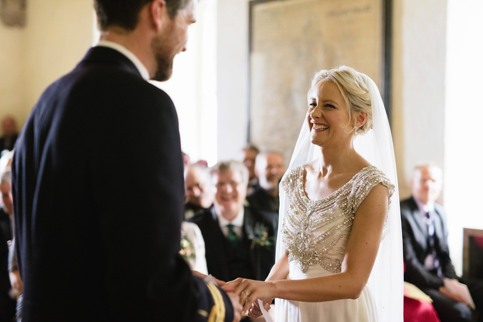 An Anna Campbell Gown, Kilts and Military Regalia for a Humanist Scottish Castle Wedding. Photography by Nikki Leadbetter.