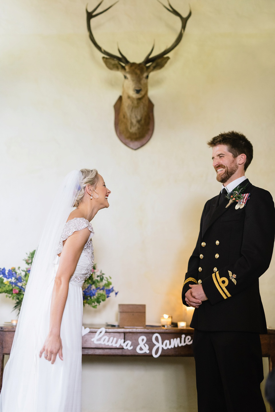 An Anna Campbell Gown, Kilts and Military Regalia for a Humanist Scottish Castle Wedding. Photography by Nikki Leadbetter.