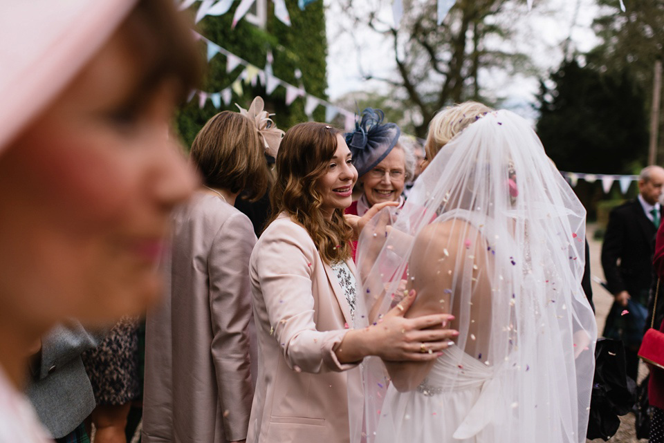 An Anna Campbell Gown, Kilts and Military Regalia for a Humanist Scottish Castle Wedding. Photography by Nikki Leadbetter.