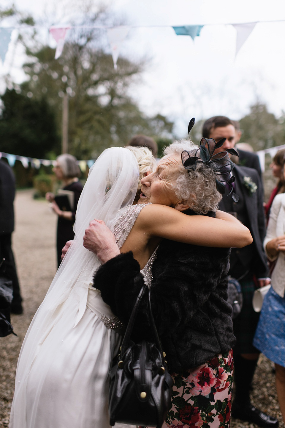 An Anna Campbell Gown, Kilts and Military Regalia for a Humanist Scottish Castle Wedding. Photography by Nikki Leadbetter.