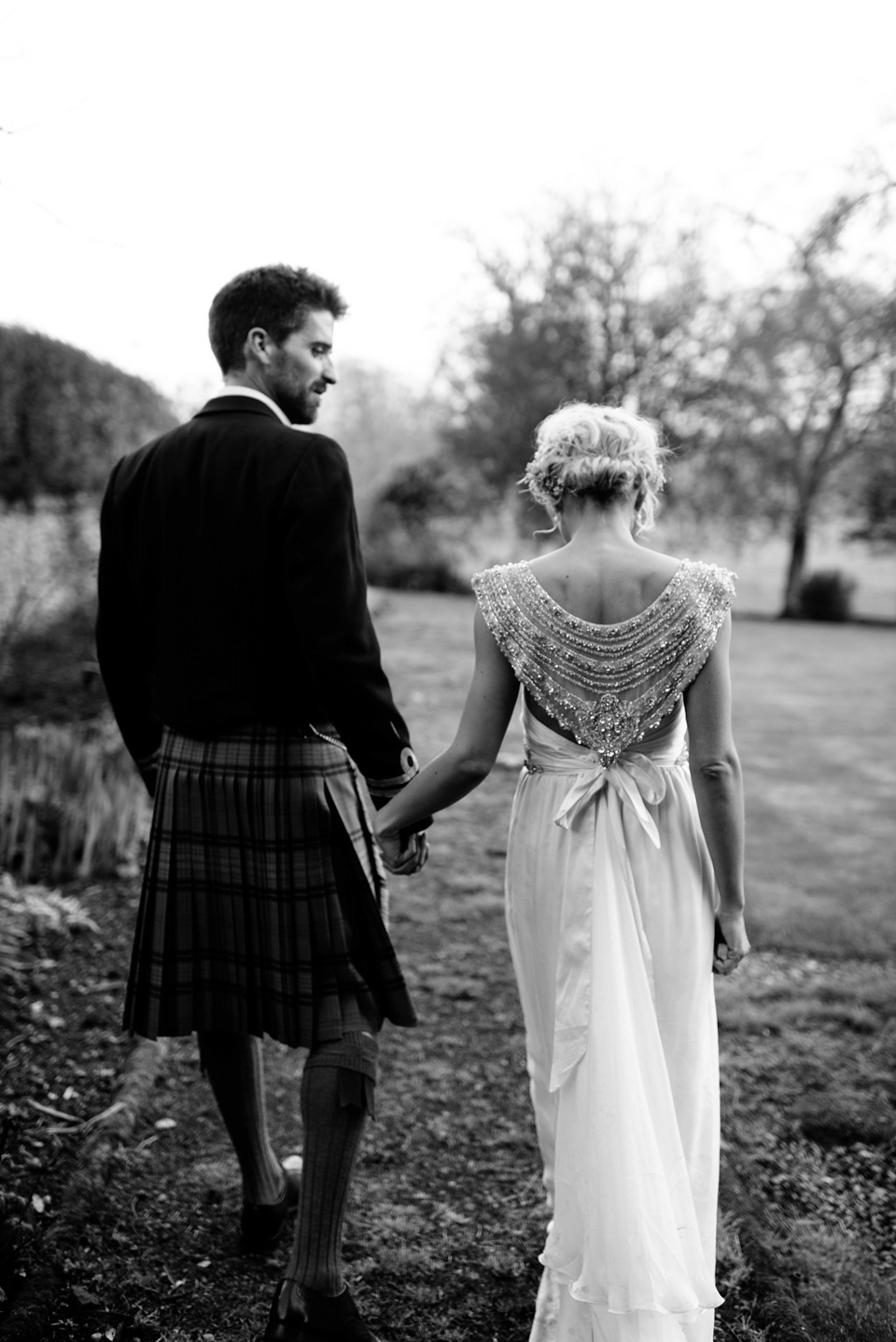 An Anna Campbell Gown, Kilts and Military Regalia for a Humanist Scottish Castle Wedding. Photography by Nikki Leadbetter.