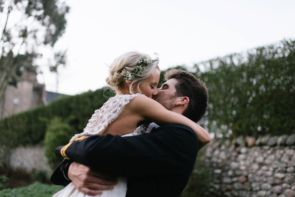 An Anna Campbell Gown, Kilts and Military Regalia for a Humanist Scottish Castle Wedding. Photography by Nikki Leadbetter.