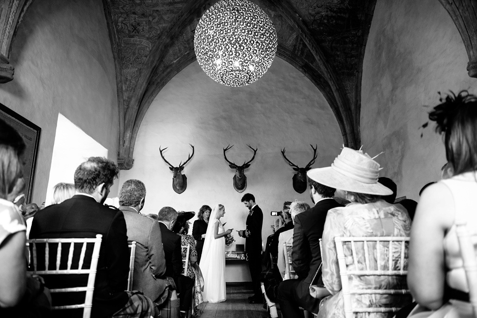 An Anna Campbell Gown, Kilts and Military Regalia for a Humanist Scottish Castle Wedding. Photography by Nikki Leadbetter.