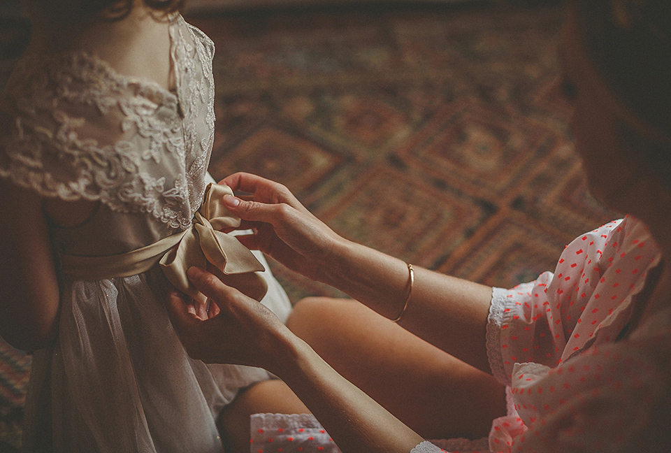 The bride wears an elegant Stephanie Allin gown for her wedding at Childerley in Cambridge. Photography by Howell Jones.