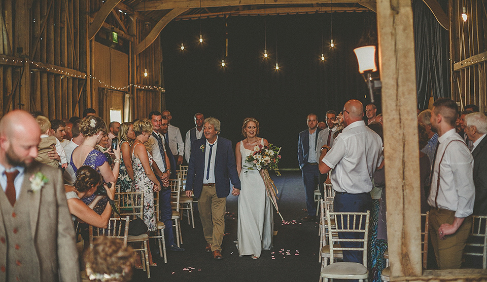 The bride wears an elegant Stephanie Allin gown for her wedding at Childerley in Cambridge. Photography by Howell Jones.