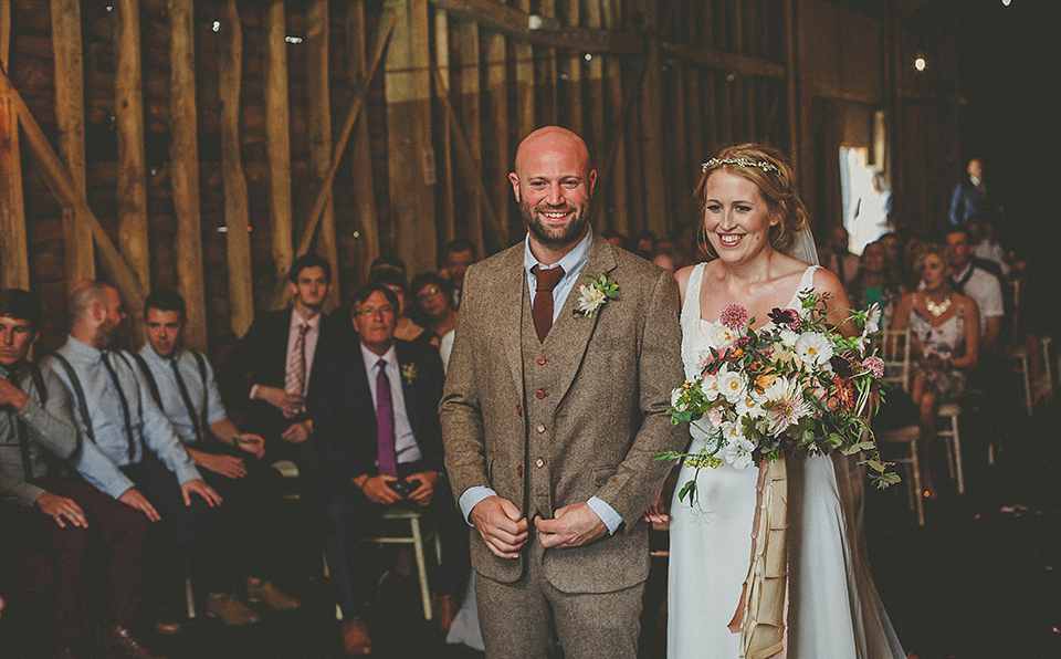 The bride wears an elegant Stephanie Allin gown for her wedding at Childerley in Cambridge. Photography by Howell Jones.