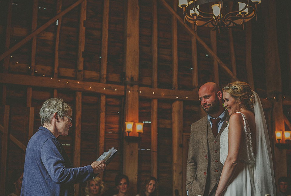 The bride wears an elegant Stephanie Allin gown for her wedding at Childerley in Cambridge. Photography by Howell Jones.