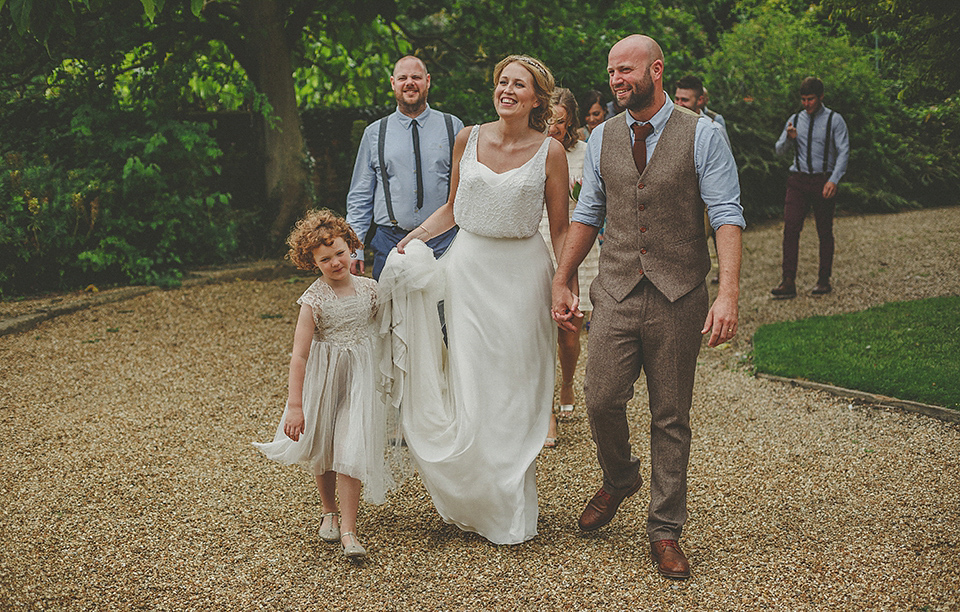 The bride wears an elegant Stephanie Allin gown for her wedding at Childerley in Cambridge. Photography by Howell Jones.