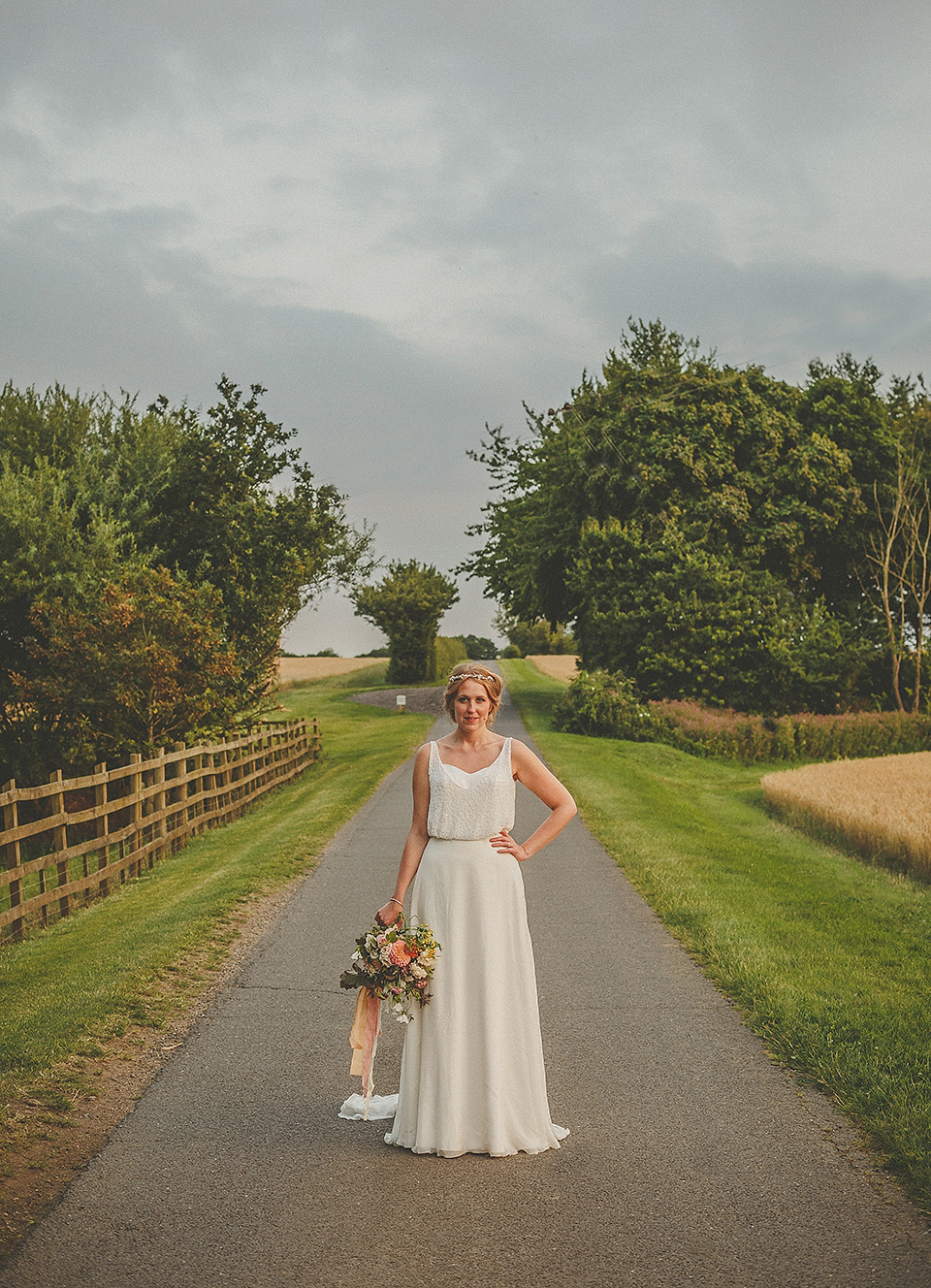 The bride wears an elegant Stephanie Allin gown for her wedding at Childerley in Cambridge. Photography by Howell Jones.