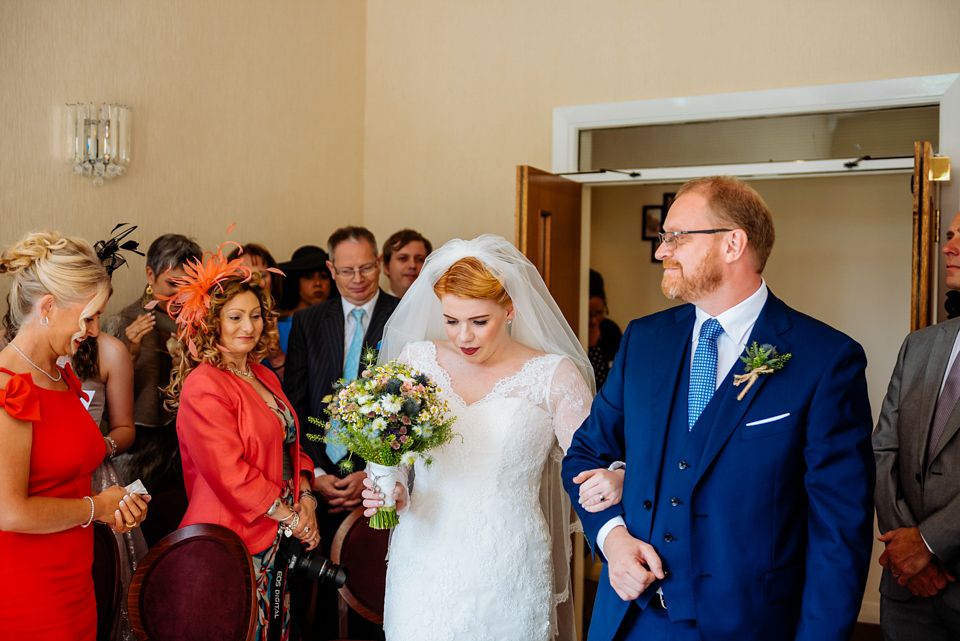 The bride wears Ellis Bridals for her colourful and quirky city wedding. Photography by Daffodil Waves.
