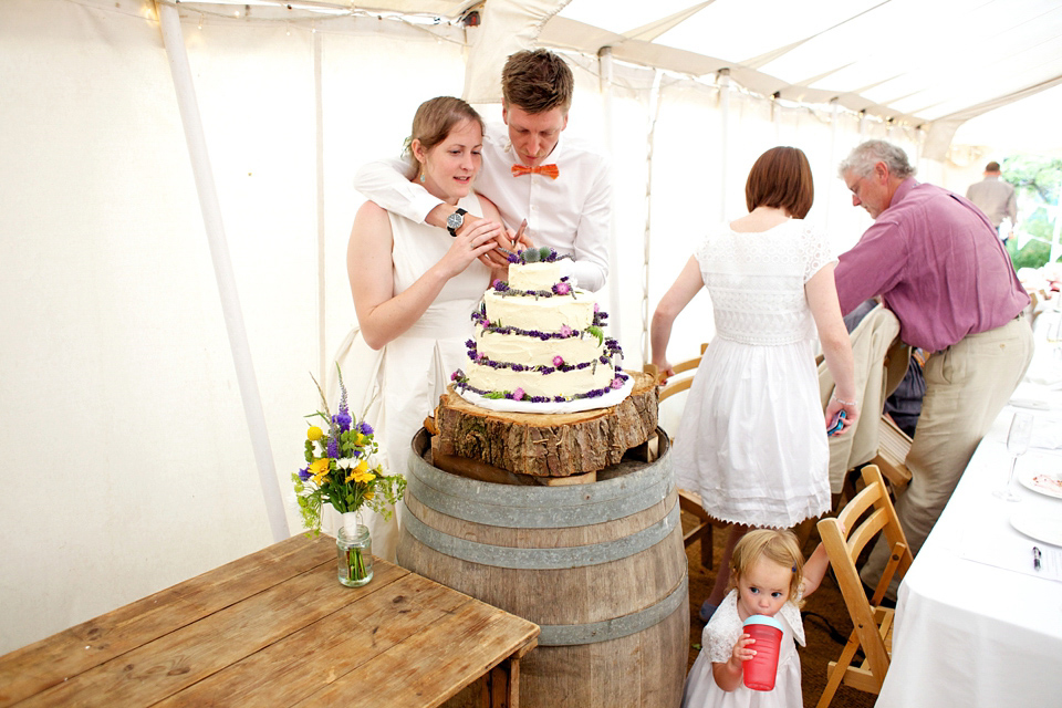 A 1950s Inspired Gown for a Homespun, Flower-Filled Country Wedding. Photography by Mawgan Lewis.