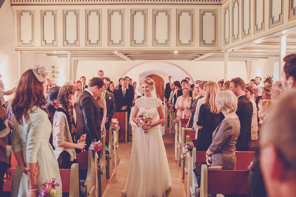 Effortless Elegance - A Raimon Bundó Bride and Colourful Floral Crown. Photography by Chris Spira.