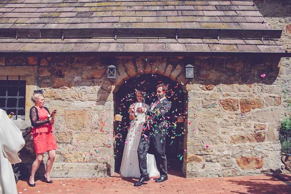 Effortless Elegance - A Raimon Bundó Bride and Colourful Floral Crown. Photography by Chris Spira.