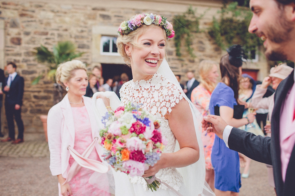 Effortless Elegance - A Raimon Bundó Bride and Colourful Floral Crown. Photography by Chris Spira.