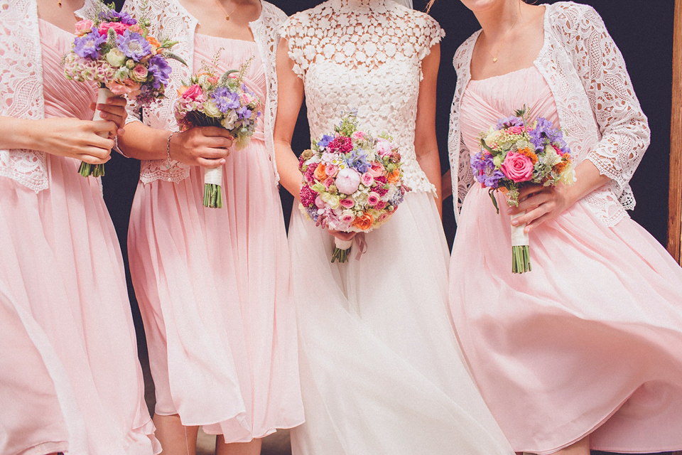 Effortless Elegance - A Raimon Bundó Bride and Colourful Floral Crown. Photography by Chris Spira.