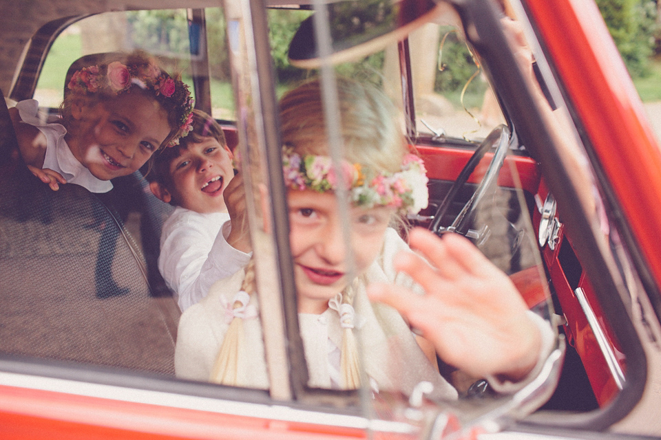 Effortless Elegance - A Raimon Bundó Bride and Colourful Floral Crown. Photography by Chris Spira.